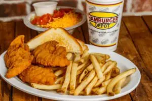 (3) Chicken strips served with fries, cream gravy, Texas toast, and a dinner salad.