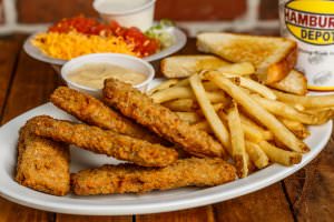 (5) Steak fingers served with fries, cream gravy, Texas toast, and a dinner salad.