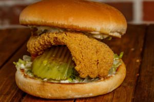 Fried fish filet, bottomed with lettuce, tomatoes, and pickles. Your choice of tartar sauce or mayonnaise.