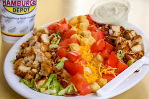 (6 oz.) Chicken breast served with lettuce, tomatoes, bacon, cheese, croutons, and your choice of dressing.