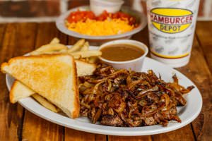 (1 lb.) Hamburger patty topped with grilled onions, served with brown gravy, fries, Texas toast, and a dinner salad.