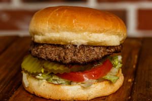 One (5 oz.) patty bottomed with lettuce, tomatoes, onions, and pickles. Your choice of condiments.