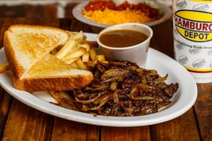(1/2 lb.) Hamburger patty topped with grilled onions, served with fries, brown gravy, Texas toast, and a dinner salad.