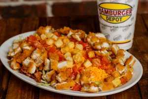 (2) Chicken strips served with lettuce, tomatoes, bacon, cheese, and croutons, and your choice of dressing.